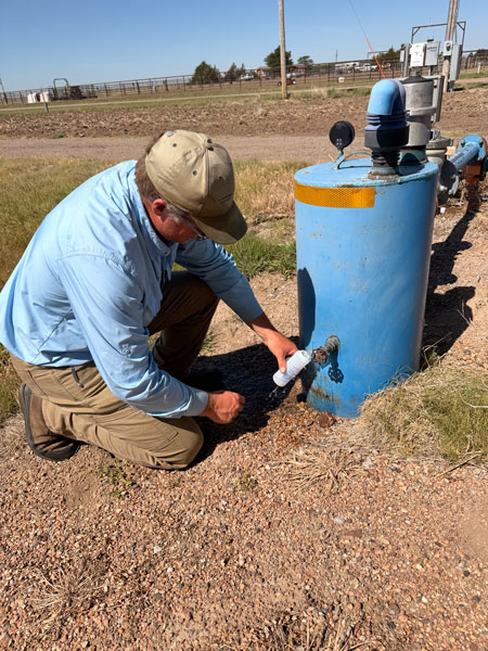 Person collected an irrigation water sample