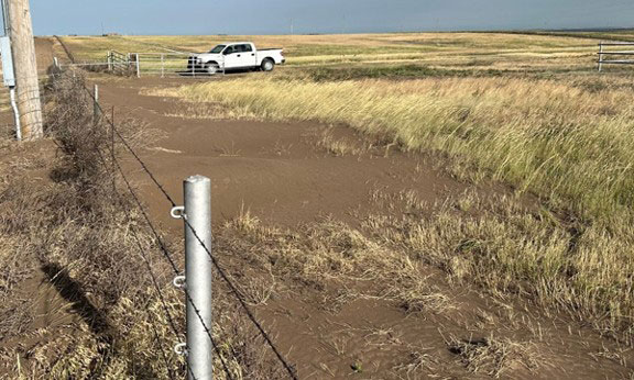 field border with eroded soil