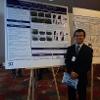 Dr. Junjun Ou Presenting Poster at NCWSS 2014