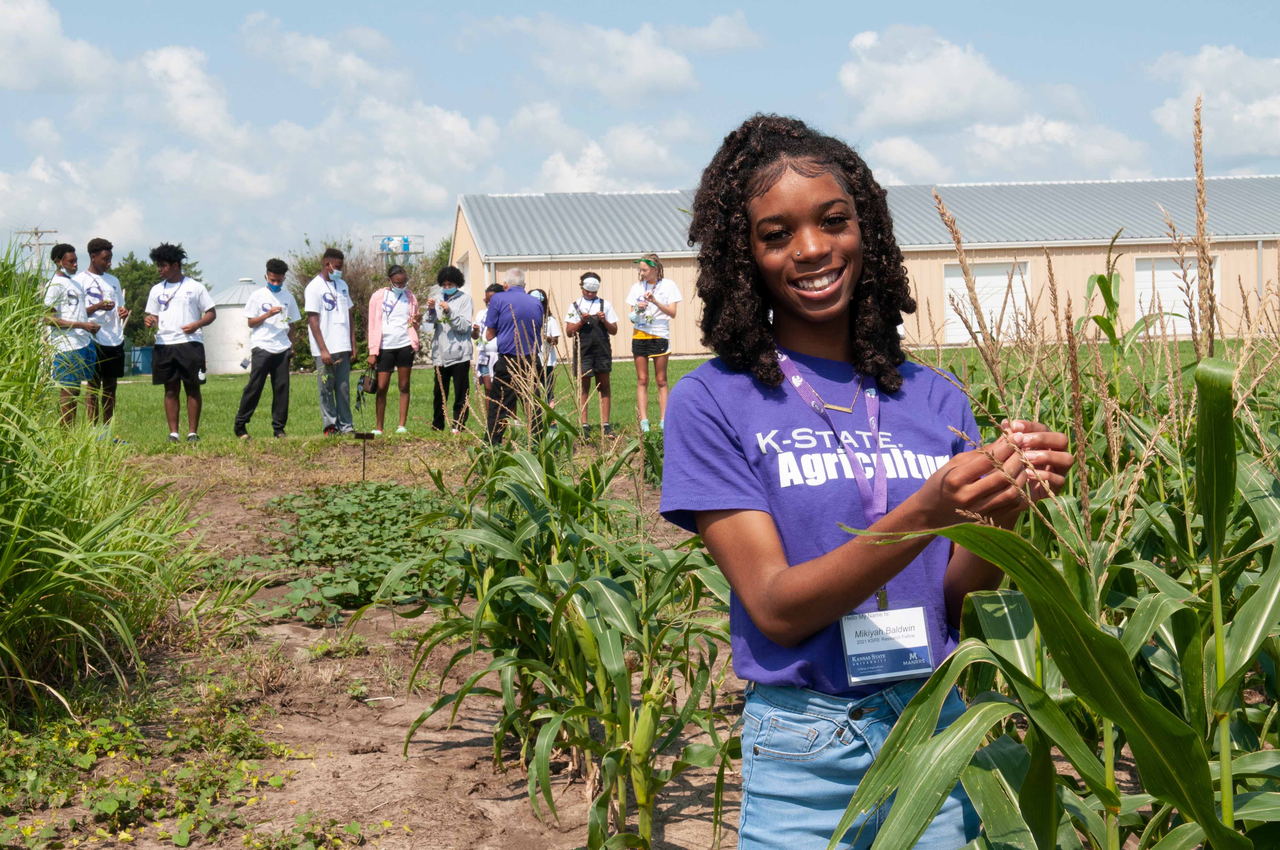Student in corn field