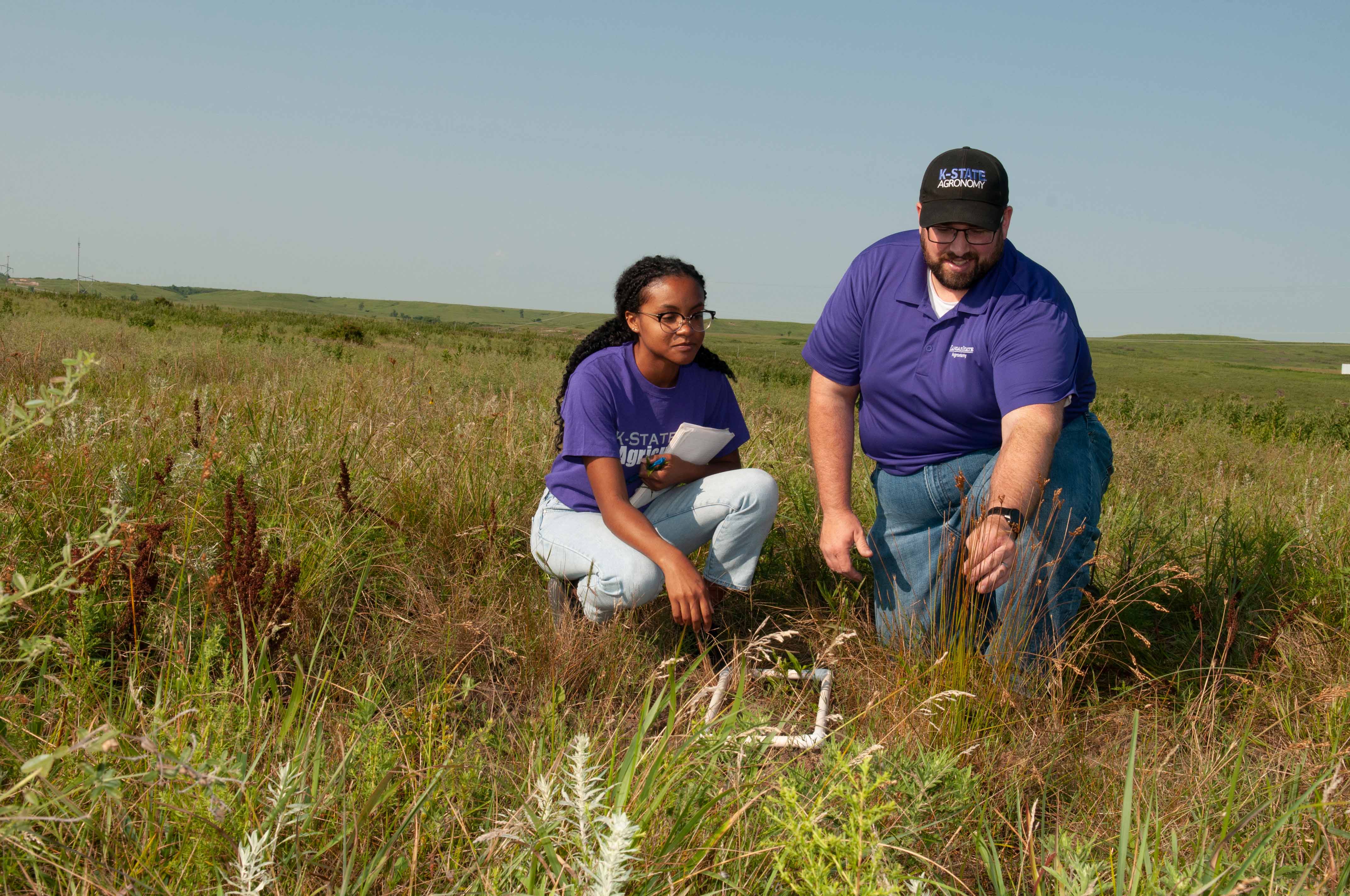 student and instructor studying forage